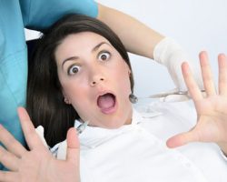 Shocked Woman | Dental Anxiety | Alluring Smiles in Mesa, AZ - Dr. Javier Portocarrero
