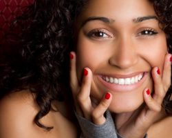 Charming Young Woman Beaming | Gum Reshaping | Alluring Smiles in Mesa, AZ - Dr. Javier Portocarrero