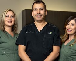 Dr. Portocarrero and his dental team at Alluring Smiles in Mesa, AZ - Dr. Javier Portocarrero