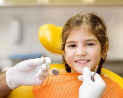 Young Kid Smiling Before Her Dental Examination | Preventative Orthodontics for Kids | Alluring Smiles in Mesa, AZ - Dr. Javier Portocarrero